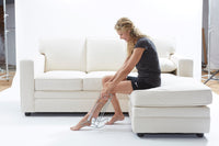 Calzador metálico ergonómico para medias de compresión