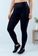 Leggings de Vie con pose relajada y fondo azul claro